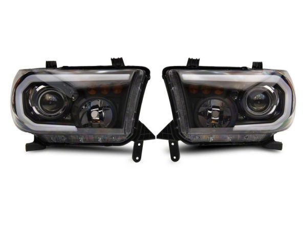 Raxiom 07-13 Toyota Tundra Axial Projector Headlights w  SEQL LED Bar- Blk Housing (Clear Lens) on Sale